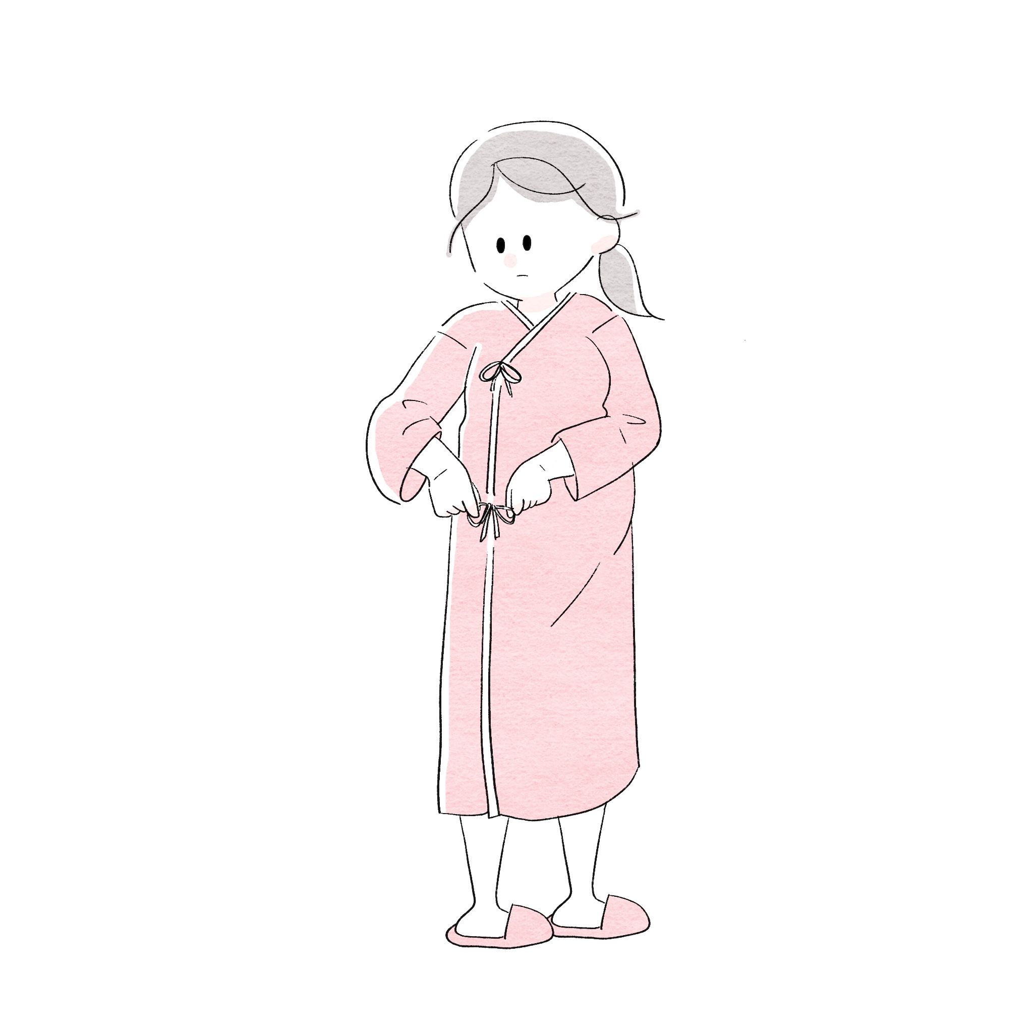 入院着に着替える女性