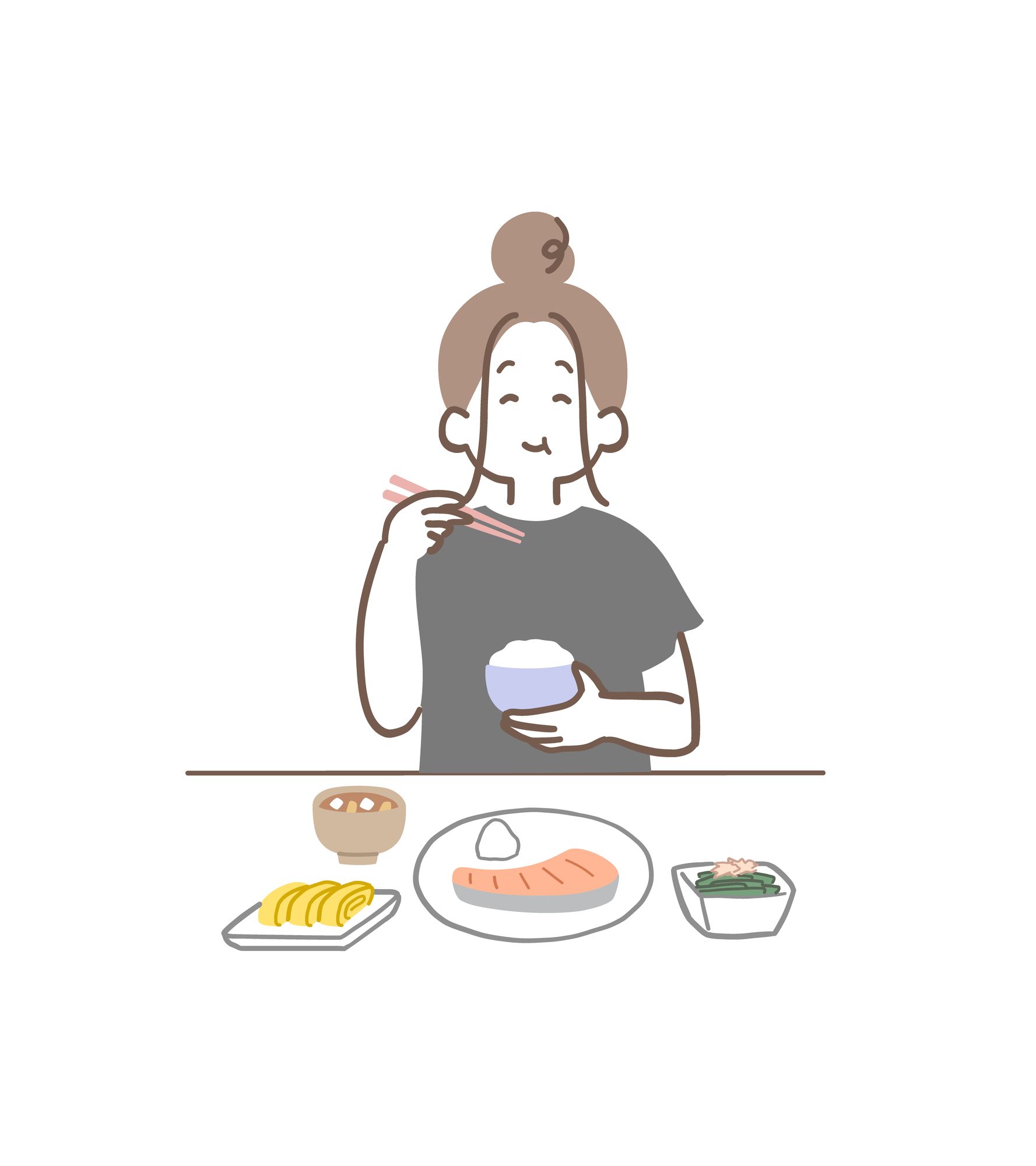 健康的な日本食(焼き鮭、卵焼き、ほうれん草のおひたし、味噌汁)を食べる女性