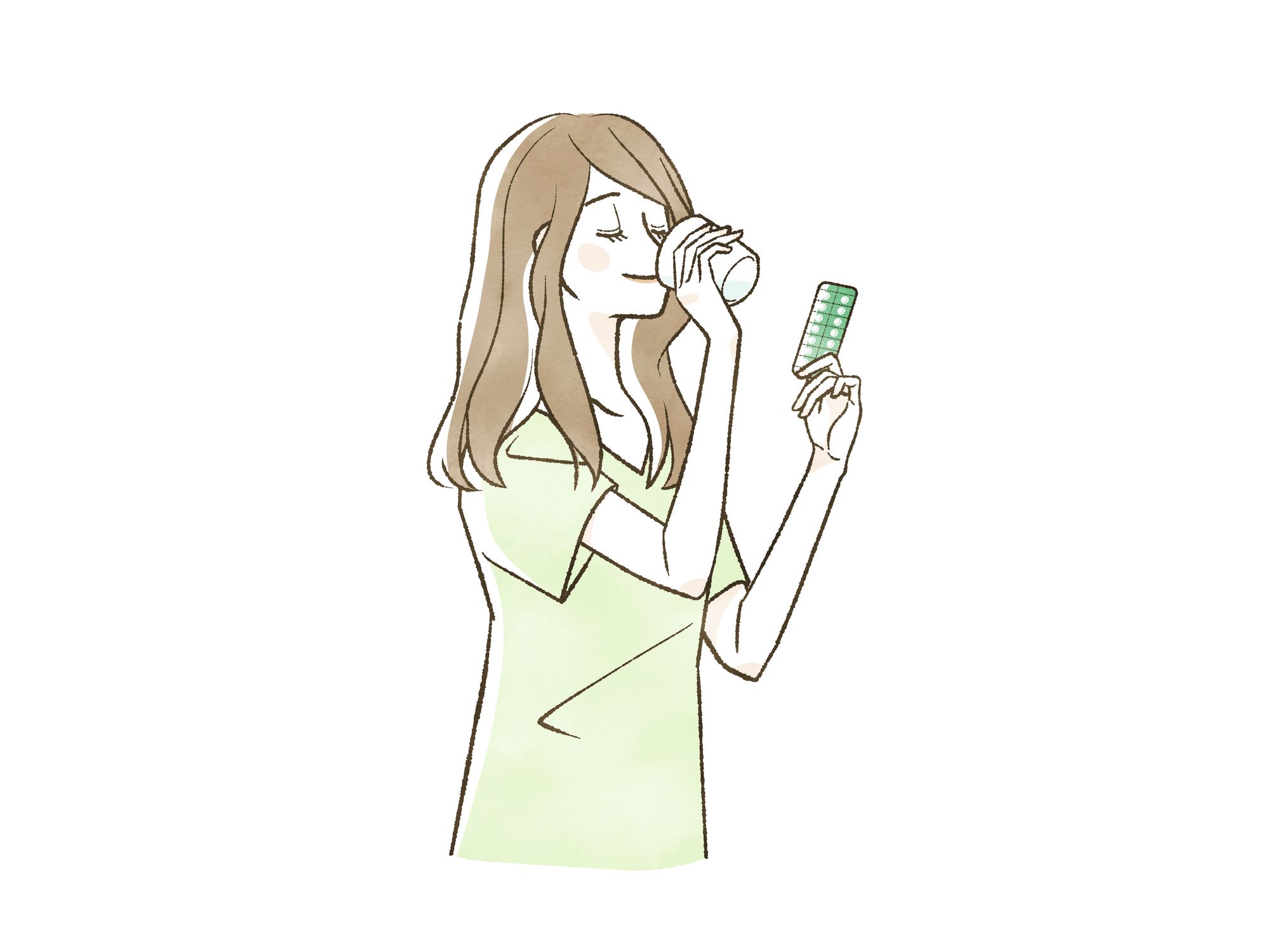 水で薬を内服するロングヘアの若い女性